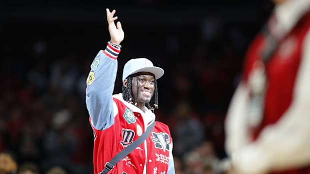 Jan 20, 2024; Columbus, Ohio, USA; Ohio State Buckeyes wide receiver Marvin Harrison Jr. is honored at center court during the first half of the game between the Ohio State Buckeyes and the Penn State Nittany Lions at Value City Arena.